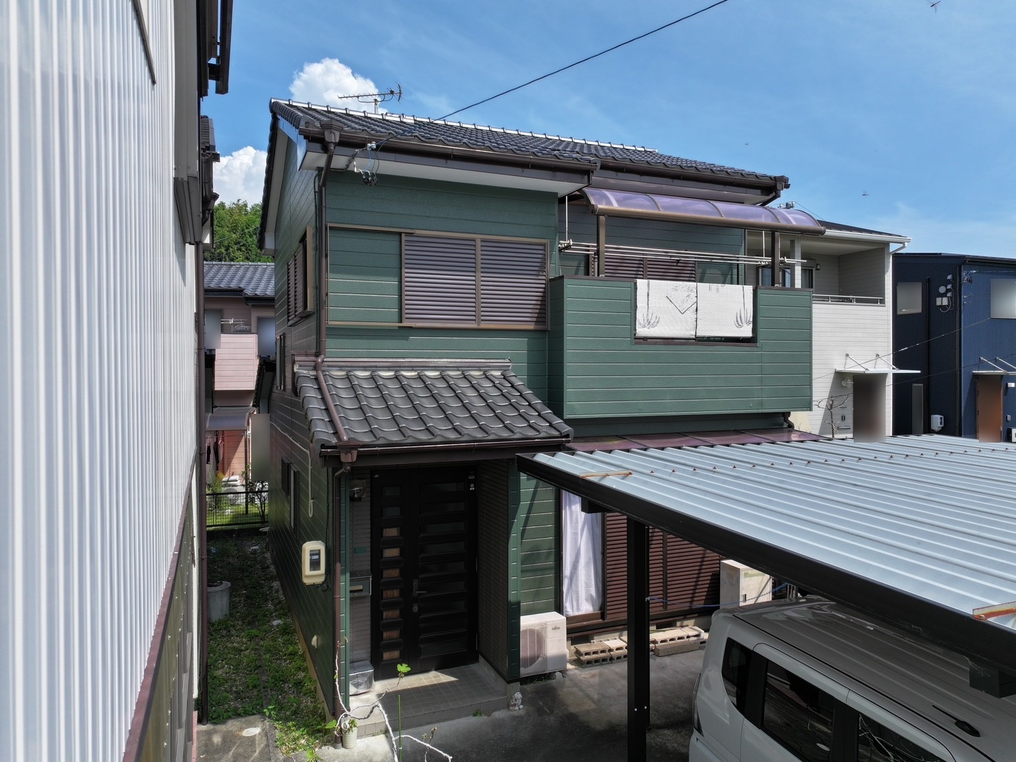新城市富沢　外壁塗替え事例【グリーン系】